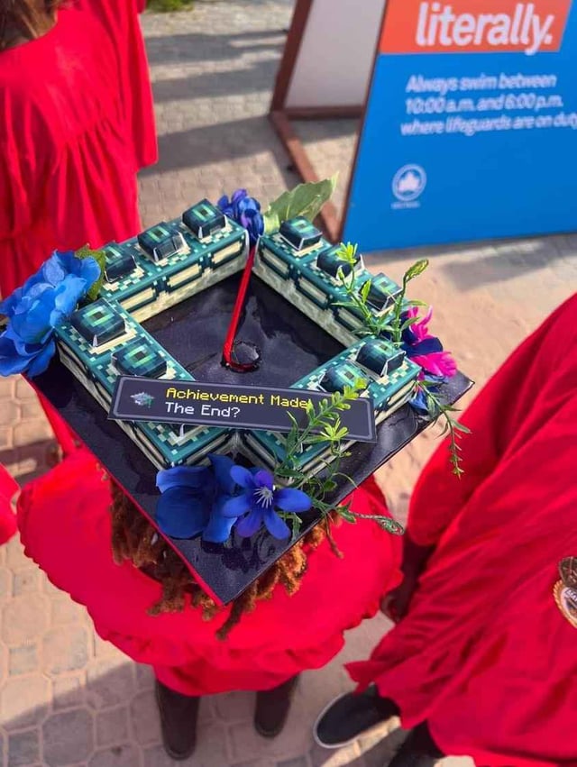 One of my students’ graduation caps that they made it an hour before the ceremony with their dad.